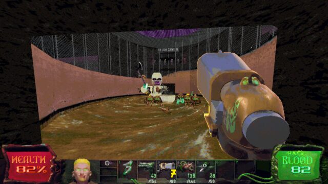 Capture d'écran du jeu Slayers-X : Terminal Aftermath - Vengeance of the Slayer.  La capture d'écran montre une vue à la première personne d'un grand robot squelette balançant une hache entouré d'ennemis crottes dans un tourbillon de crottes.