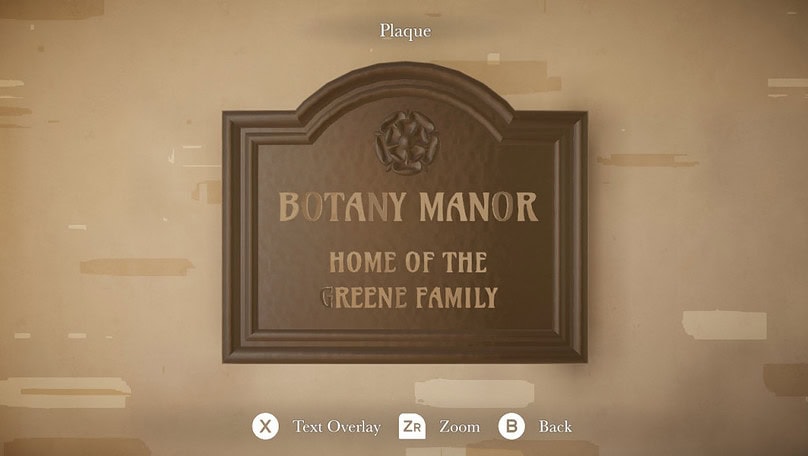 capture d'écran montrant une plaque marron sur le mur de briques.  Il est écrit dessus en lettres dorées "Botany Manor, demeure de la famille Greene"