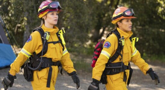 Maya Bishop (Danielle Savre) and Andy Herrera (Jaina Lee Ortiz) walk in the forest during the Station 19 episode