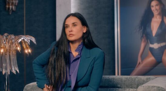 Demi Moore looking stoic starring in the body horror flick