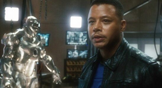 Iron Man Terrence Howard, standing in front of some armor