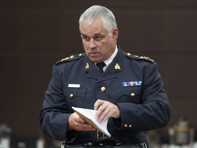 Le commissaire par intérim de la GRC, Mike Duheme, attend de comparaître devant le Comité de la procédure et des affaires de la Chambre, à Ottawa, le mardi 13 juin 2023.