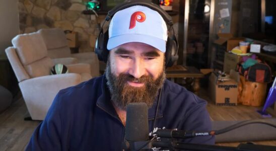 Jason Kelce smiles while recording his podcast New Heights.