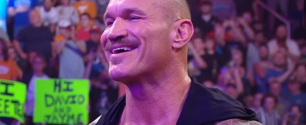Randy Orton smiling at Cody Rhodes