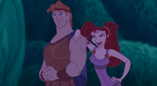Meg with her arm on Hercules