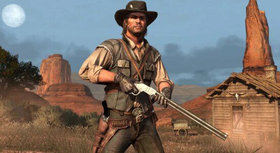 Red Dead Redemption: John Marston holds a shotgun.