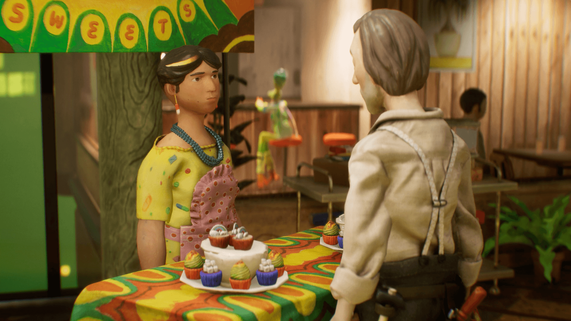 Une scène de pâte à modeler colorée avec deux personnages au premier plan conversant