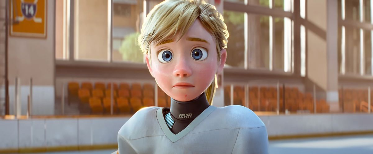 Riley d'Inside Out, maintenant âgé de 13 ans, se tient en tenue de hockey sur la glace d'une patinoire, l'air inquiet, dans Inside Out 2 du studio d'animation Pixar.