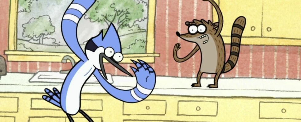 Rigby and Mordecai celebrating free cake in the kitchen on Regular Show