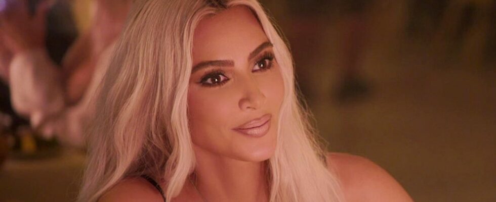 Kim Kardashian sitting in front of a candle in The Kardashians.