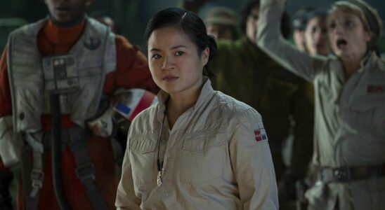 Rose Tico standing during Resistance meeting in The Rise of Skywalker