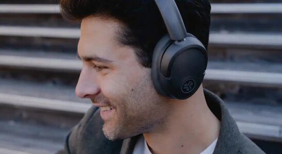 JLab - man wearing over the ear headphones