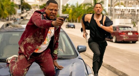 Martin Lawrence with gun on car and Will Smith running in Bad Boys: Ride or Die still