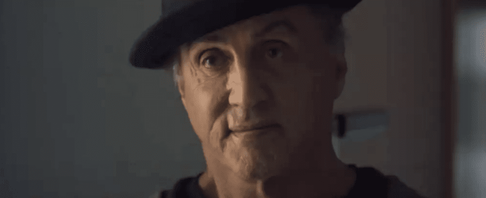 Sylvester Stallone in Creed II wearing a hat.