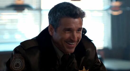 Patrick Dempsey laughs at a diner counter in uniform in Thanksgiving.