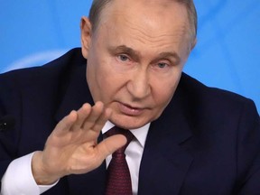 Le président russe Vladimir Poutine s'exprime lors d'une réunion au ministère russe des Affaires étrangères à Moscou, le vendredi 14 juin 2024.