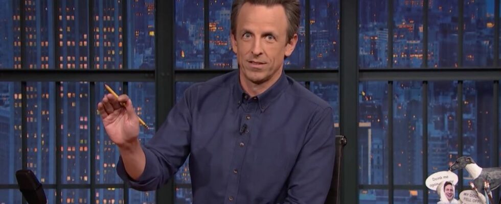 Seth Meyers speaking at his desk on Late Night