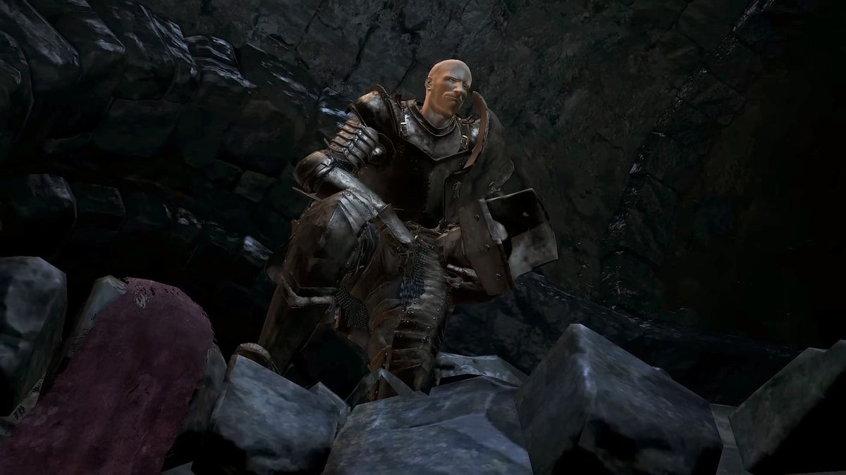 Patches, portant l'armure de « Lapp », regarde le joueur qu'il a poussé par-dessus un rebord dans une capture d'écran de Dark Souls 3: The Ringed City