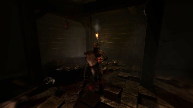 Amnesia The Dark Descent : un monstre effrayant avec une grande mâchoire debout près d'un puits sombre.