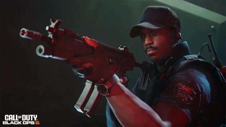 A man wearing a black baseball cap aiming down an SMGs sights.