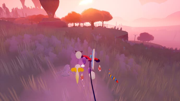 Coucher de soleil à Flock avec le ciel brûlant tandis que le joueur et son troupeau s'approchent d'un horizon rempli d'un groupe d'arbres.