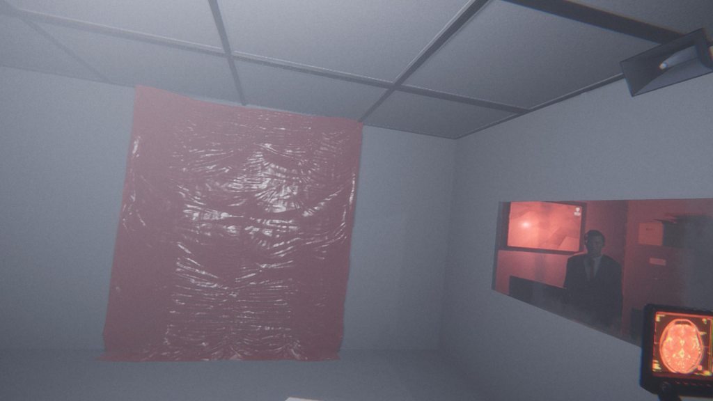 Capture d'écran de Shift 87 montrant une étrange machine avec un mur blanc recouvert de plastique rouge et un homme étrange qui regarde
