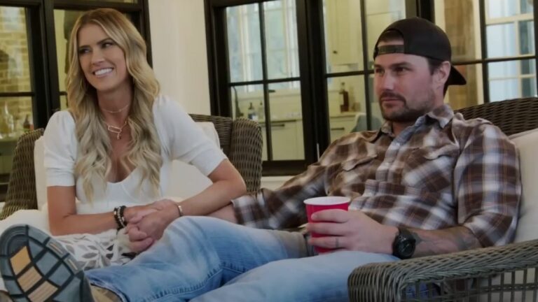 Christina and Josh Hall are shown in their living room on Christina in the Country. 