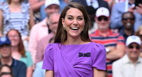 Kate, Princess of Wales, stands on court to present the trophy to the winner of the men's final on day fourteen of the Wimbledon Tennis Championships at the All England Lawn Tennis and Croquet Club on July 14 in London