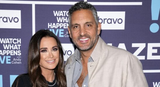 Kyle Richards and Mauricio posing together at WWHL