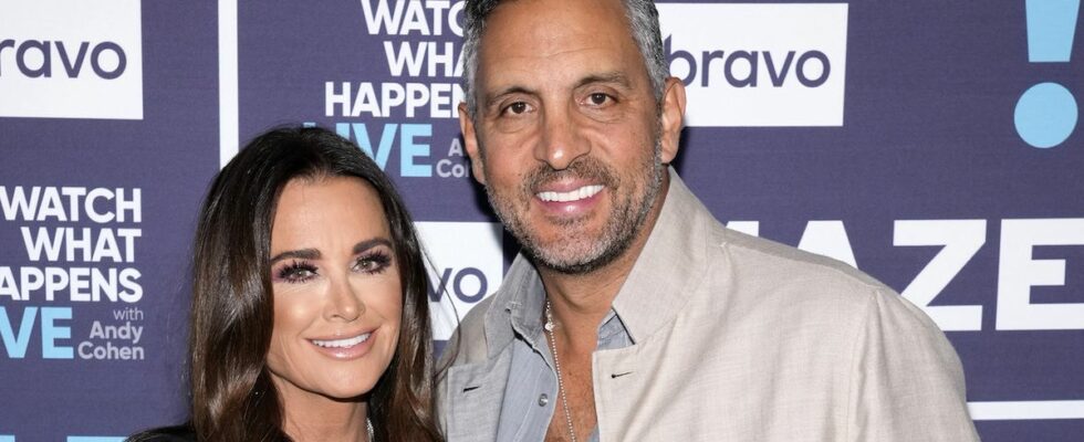 Kyle Richards and Mauricio posing together at WWHL