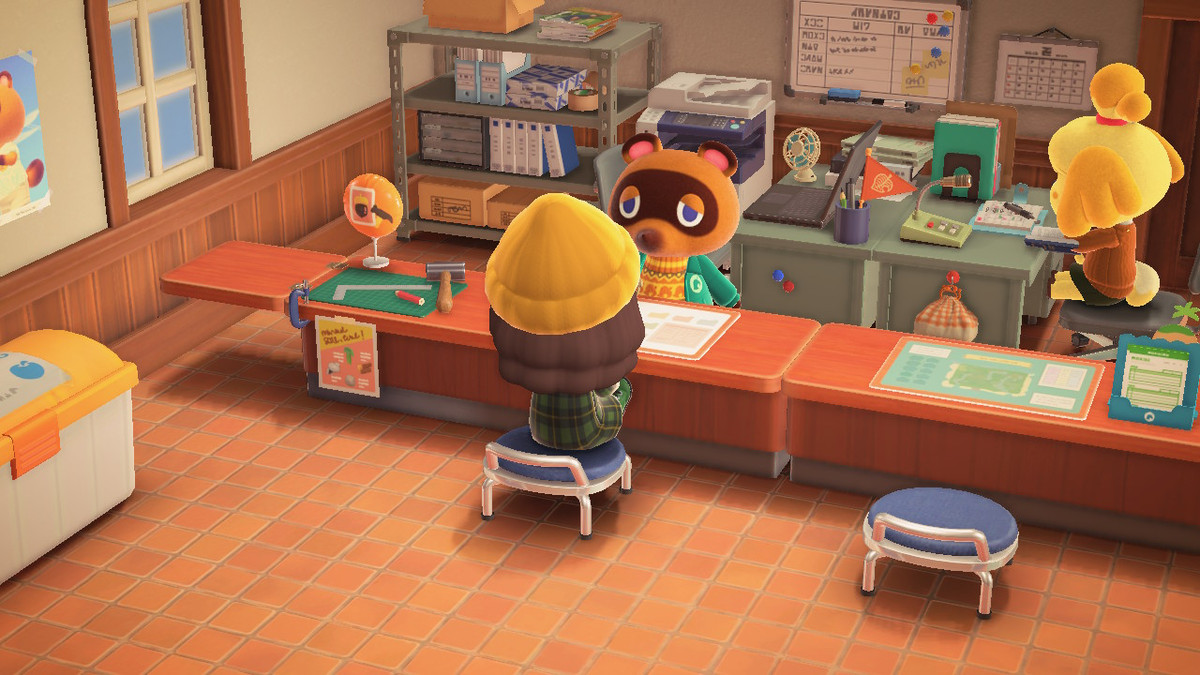 Un villageois d'Animal Crossing: New Horizons assis sur le banc de construction de Tom Nook, à l'intérieur du bâtiment des services de l'île