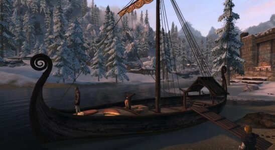 Skyrim: a wooden Biking-style boat sits at a snowy dock.