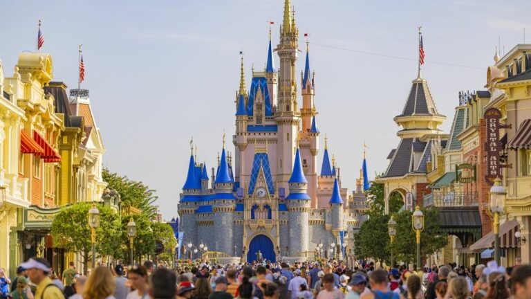 Cinderella Castle in the distance of Main Street U.S.A with crowds