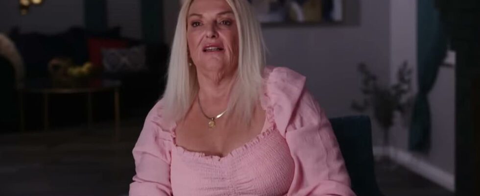 Angela from 90 Day Fiance, a blonde-haired woman sitting, wearing a pink top