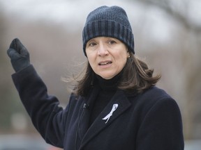 Nathalie Provost, une survivante de la fusillade de l'École Polytechnique en 1989, prend la parole lors d'un événement à Montréal, le dimanche 6 décembre 2020.