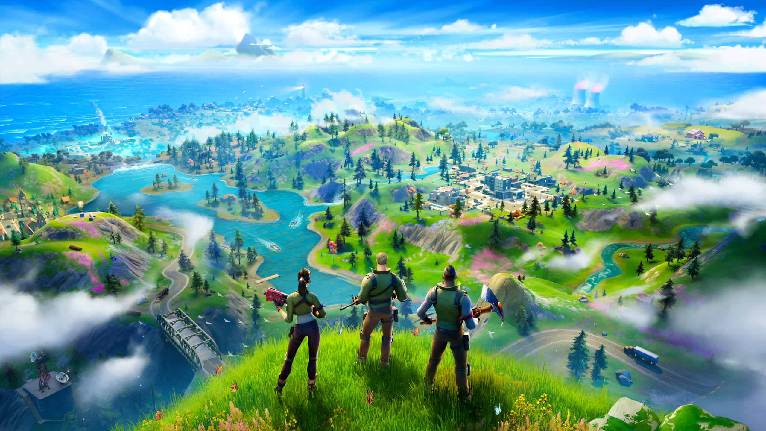 Trois personnages surplombant un paysage de jeu vidéo vibrant et luxuriant avec des rivières, des champs et des villes lointaines sous un ciel bleu clair.