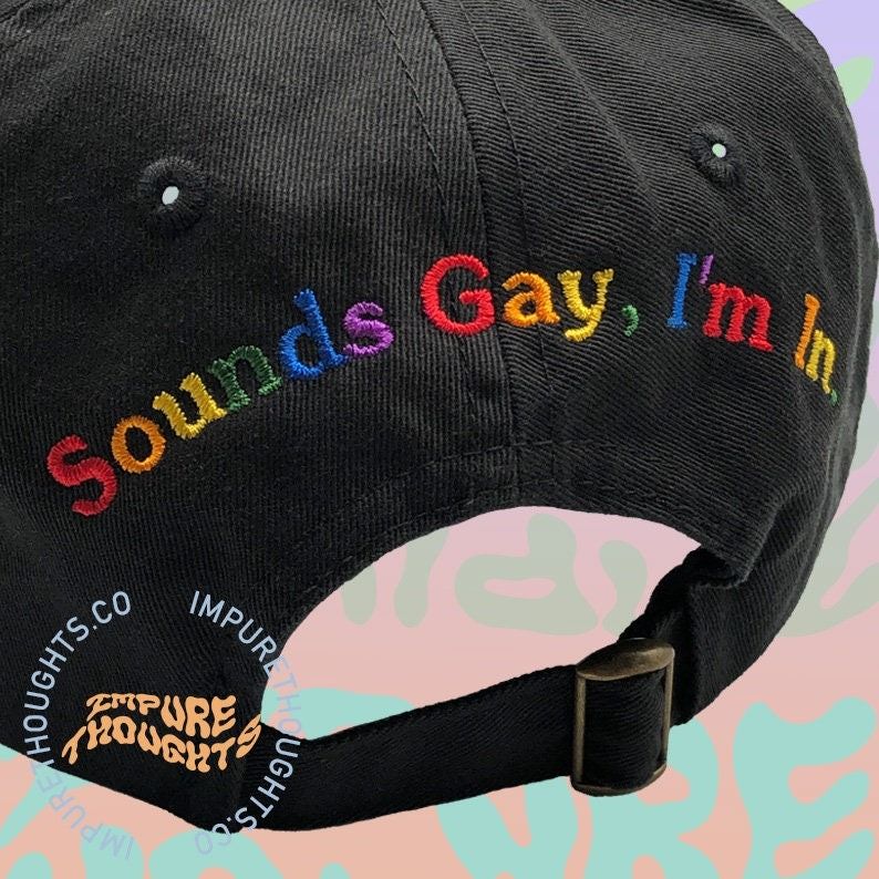 casquette de baseball avec "Ça a l'air gay, je suis partant" brodé en lettres arc-en-ciel