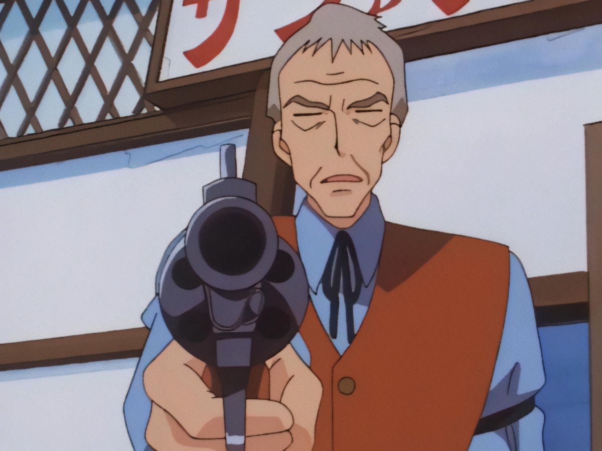 Un vieil homme d'anime portant une veste marron sans manches pointant un revolver sur l'écran dans Pokémon.