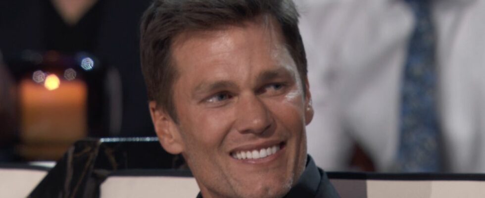 Tom Brady smiling in the Roast of Tom Brady