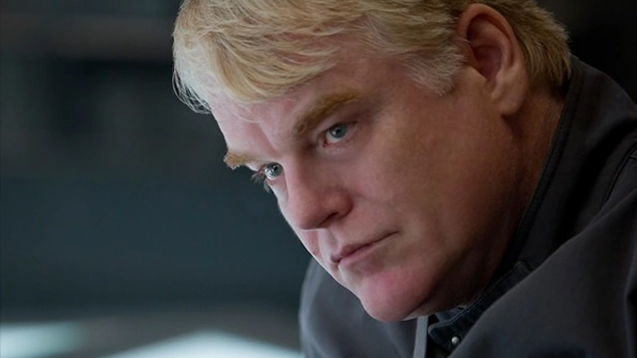 Affiche de Philip Seymour Hoffman dans le rôle de Plutrach Heavensbee dans Hunger Games La Révolte, partie 1