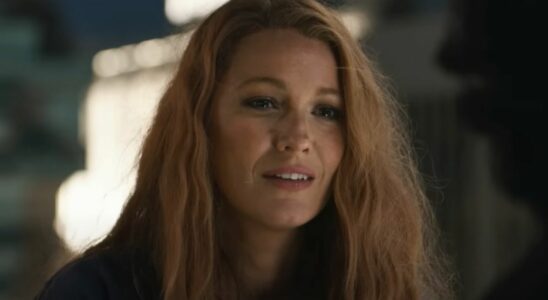 A close up of Blake Lively kind of smiling in It Ends With Us.