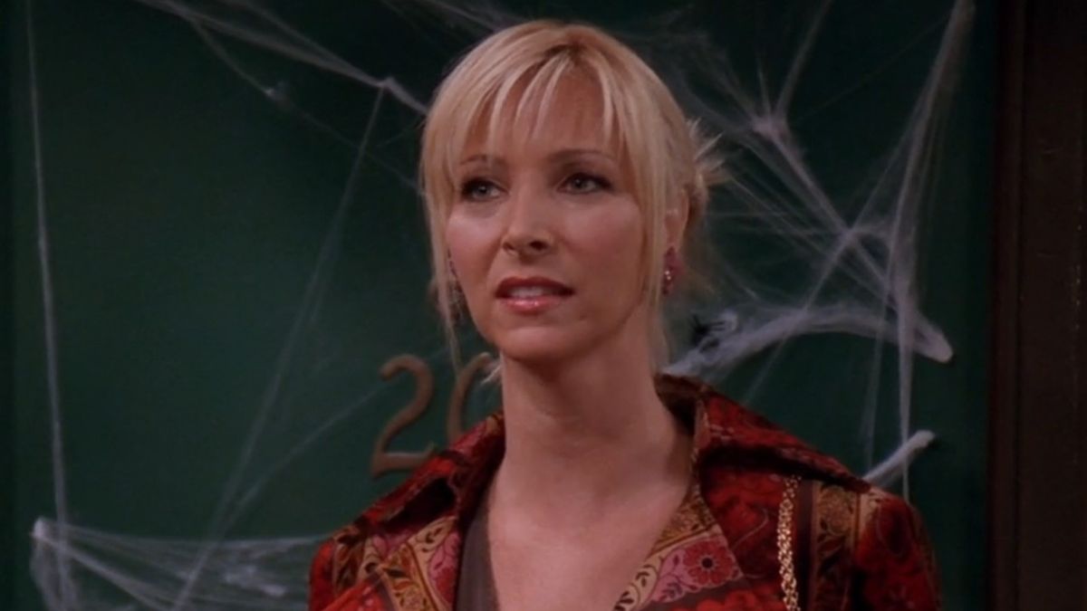 Phoebe in apartment hallway on Halloween in Friends