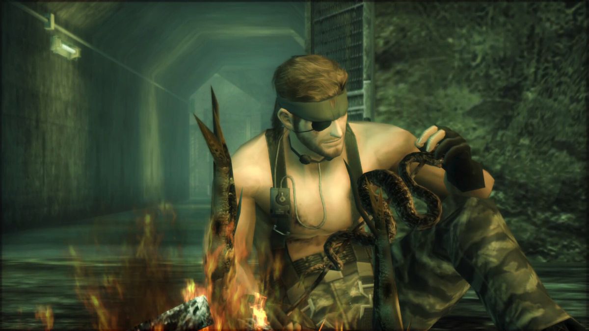 Naked Snake fait cuire un serpent et un poisson sur un feu de camp dans une capture d'écran de Metal Gear Solid 3: Snake Eater de Metal Gear Solid: Master Collection