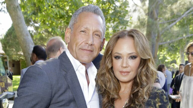 Angelo Pagan and Leah Remini