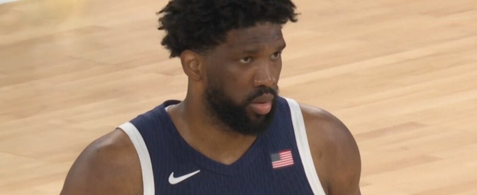 Joel Embiid prepares for the tip off against Serbia at the Olympics.