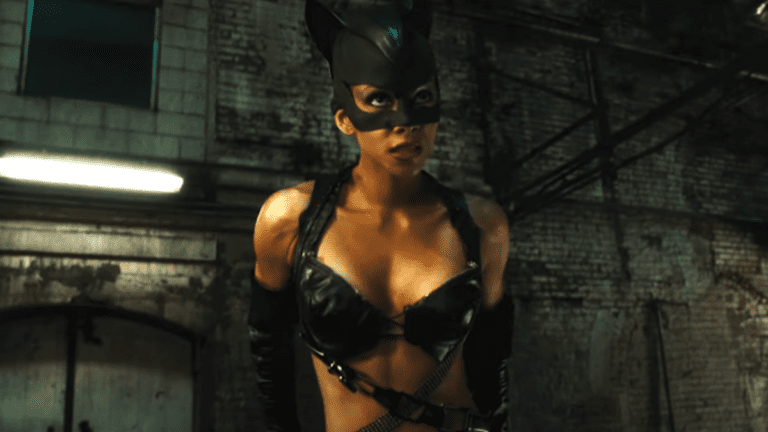 Halle Berry in Catwoman suit in an alley