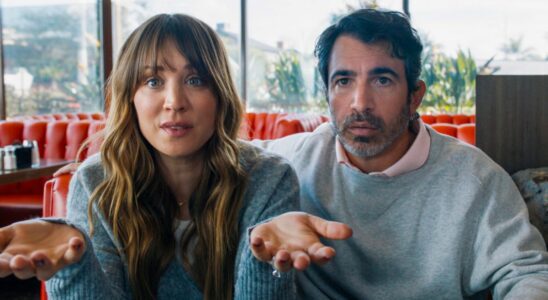 Kaley Cuoco and Chris Messina sitting in a diner with expressive faces in Based on a True Story.