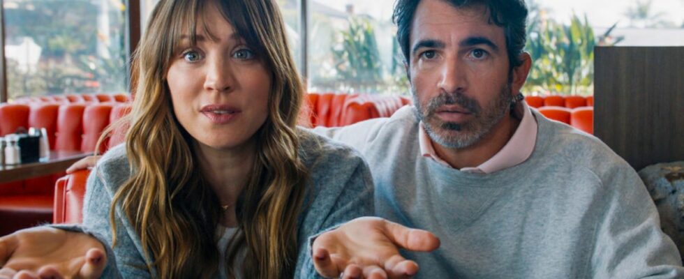 Kaley Cuoco and Chris Messina sitting in a diner with expressive faces in Based on a True Story.