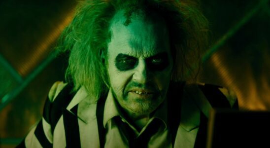 Michael Keaton grimaces in full makeup in Beetlejuice Beetlejuice.