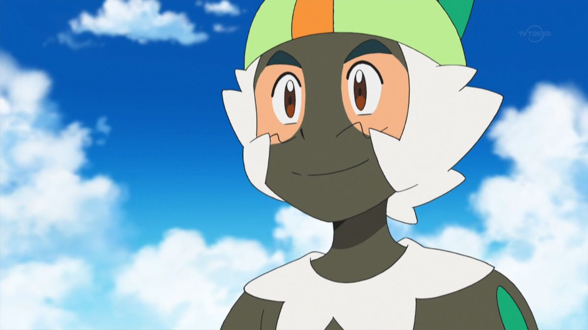 Un garçon d'anime dans un costume de lémurien avec du maquillage marron sur le visage dans Pokémon.